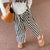 Loose White Pullover / Vertical Stripe Wide Leg Trousers Set